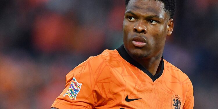 Netherlands' defender Denzel Dumfries celebrates after he scored during the UEFA Nations League, League A Group 4 football match between Netherlands and Poland at the Feyenoord "De Kuip" stadium in Rotterdam on June 11, 2022. (Photo by JOHN THYS / various sources / AFP) (Photo by JOHN THYS/AFP via Getty Images)