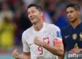 DOHA, QATAR - DECEMBER 04: Robert Lewandowski of Poland celebrates after scoring the team's first goal during the FIFA World Cup Qatar 2022 Round of 16 match between France and Poland at Al Thumama Stadium on December 04, 2022 in Doha, Qatar. (Photo by Justin Setterfield/Getty Images)