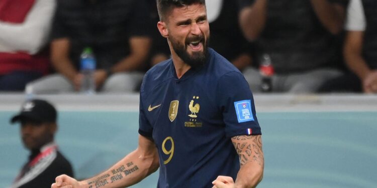 TOPSHOT - France's forward #09 Olivier Giroud celebrates scoring his team's second goal during the Qatar 2022 World Cup quarter-final football match between England and France at the Al-Bayt Stadium in Al Khor, north of Doha, on December 10, 2022. (Photo by FRANCK FIFE / AFP)