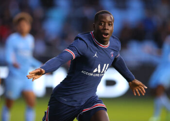 MANCHESTER, ENGLAND - NOVEMBER 24:  Djeidi Gassama of Paris Saint-Germain celebrates after scoring the opening goal during the UEFA Youth League match between Manchester City and Paris Saint-Germain at Manchester City Football Academy on November 24, 2021 in Manchester, England. (Photo by Alex Livesey - Danehouse/Getty Images)