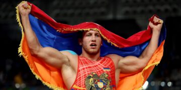 RIO DE JANEIRO, BRAZIL - AUGUST 16:  Artur Aleksanyan of Armenia celebrates after defeating Yasmany Daniel Lugo Cabrera of Cuba in the Men's Greco-Roman 98 kg Gold Medal final bout on Day 11 of the Rio 2016 Olympic Games at Carioca Arena 2 on August 16, 2016 in Rio de Janeiro, Brazil.  (Photo by Sean M. Haffey/Getty Images)