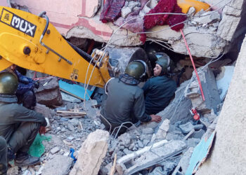 Rescue workers search for survivors in a collapsed house in Moulay Brahim, Al Haouz province, on September 9, 2023, after an earthquake. Morocco's deadliest earthquake in decades has killed at least 820 people, officials said on September 9, causing widespread damage and sending terrified residents and tourists scrambling to safety in the middle of the night. (Photo by Fadel SENNA / AFP) (Photo by FADEL SENNA/AFP via Getty Images)