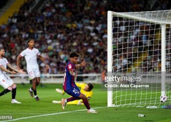 BARCELONA, SPAIN - SEPTEMBER 29: Lamine Yamal of Barcelona celebrates as Sergio Ramos of Sevilla scores an own-goal during the LaLiga EA Sports match between FC Barcelona and Sevilla FC at Estadi Olimpic Lluis Companys on September 29, 2023 in Barcelona, Spain. (Photo by Alex Caparros/Getty Images)