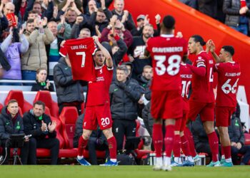 LIVERPOOL, ENGLAND - Sunday, October 29, 2023: Liverpool's Diogo Jota celebrates after scoring the opening goal by displaying the shirt of team-mate Luis Díaz, who's parents were kidnaped in Colombia, during the FA Premier League match between Liverpool FC and Nottingham Forest FC at Anfield. (Photo by David Rawcliffe/Propaganda)