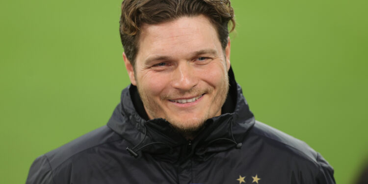 DORTMUND, GERMANY - APRIL 14: Edin Terzic, Head Coach of Borussia Dortmund reacts as he is interviewed prior to the UEFA Champions League Quarter Final Second Leg match between Borussia Dortmund and Manchester City at Signal Iduna Park on April 14, 2021 in Dortmund, Germany. Sporting stadiums around Germany remain under strict restrictions due to the Coronavirus Pandemic as Government social distancing laws prohibit fans inside venues resulting in games being played behind closed doors.  (Photo by Friedemann Vogel - Pool/Getty Images)