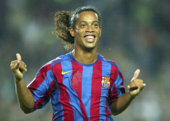 BARCELONA, SPAIN - OCTOBER 30: Ronaldinho of FC Barcelona celebrates his goal during the La Liga match between FC Barcelona and Real Sociedad, on October 30, 2005 at the Camp Nou stadium in Barcelona, Spain. (Photo by Luis Bagu/Getty Images) *** Local Caption *** Ronaldinho