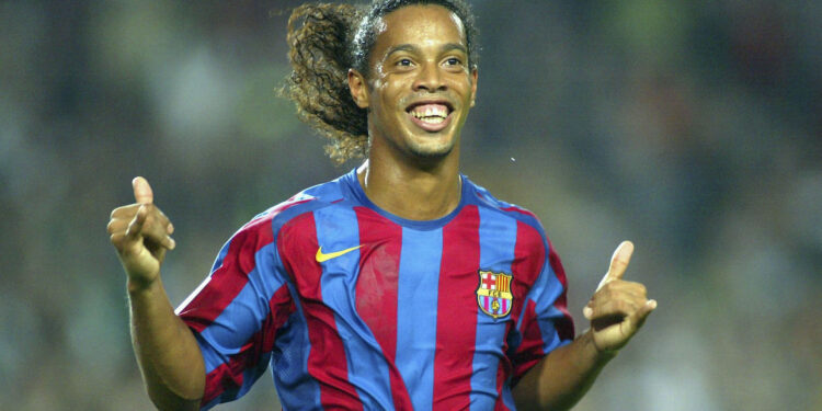BARCELONA, SPAIN - OCTOBER 30: Ronaldinho of FC Barcelona celebrates his goal during the La Liga match between FC Barcelona and Real Sociedad, on October 30, 2005 at the Camp Nou stadium in Barcelona, Spain. (Photo by Luis Bagu/Getty Images) *** Local Caption *** Ronaldinho