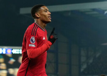 Liverpool, England, 26th November 2023. Anthony Martial of Manchester United, ManU celebrates scoring their third goal past Jordan Pickford of Everton during the Premier League match at Goodison Park, Liverpool. Picture credit should read: Andrew Yates / Sportimage EDITORIAL USE ONLY. No use with unauthorised audio, video, data, fixture lists, club/league logos or live services. Online in-match use limited to 120 images, no video emulation. No use in betting, games or single club/league/player publications. SPI-2744-0073