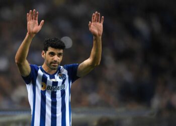FC Porto's Iranian forward Mehdi Taremi waves to supporters during the Portuguese league football match between FC Porto and FC Pacos de Ferreira at the Dragao stadium in Porto on November 5, 2022. (Photo by MIGUEL RIOPA / AFP) (Photo by MIGUEL RIOPA/AFP via Getty Images)