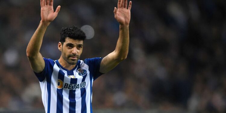 FC Porto's Iranian forward Mehdi Taremi waves to supporters during the Portuguese league football match between FC Porto and FC Pacos de Ferreira at the Dragao stadium in Porto on November 5, 2022. (Photo by MIGUEL RIOPA / AFP) (Photo by MIGUEL RIOPA/AFP via Getty Images)