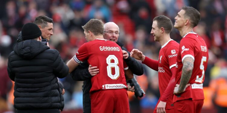 LIVERPOOL, ENGLAND - MARCH 23: Steven Gerrard embraces Sven-Goran Eriksson, Manager of Liverpool Legends, after the team's victory during the LFC Foundation charity match between Liverpool FC Legends and AFC Ajax Legends at Anfield on March 23, 2024 in Liverpool, England. (Photo by Clive Brunskill/Getty Images)