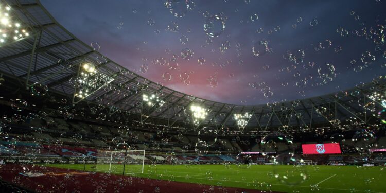 Bubbles float across the pitch at half time of the English Premier League football match between West Ham United and Chelsea at The London Stadium, in east London on July 1, 2020. (Photo by Julian Finney / POOL / AFP) / RESTRICTED TO EDITORIAL USE. No use with unauthorized audio, video, data, fixture lists, club/league logos or 'live' services. Online in-match use limited to 120 images. An additional 40 images may be used in extra time. No video emulation. Social media in-match use limited to 120 images. An additional 40 images may be used in extra time. No use in betting publications, games or single club/league/player publications. /  (Photo by JULIAN FINNEY/POOL/AFP via Getty Images)