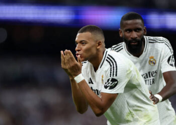 MADRID, SPAIN - SEPTEMBER 17: Kylian Mbappe  (L) of Real Madrid CF celebrates scoring their opening goal with teammate Antonio Rudiger (R) during the UEFA Champions League 2024/25 League Phase MD1 match between Real Madrid C.F. and VfB Stuttgart at Estadio Santiago Bernabeu on September 17, 2024 in Madrid, Spain. (Photo by Gonzalo Arroyo - UEFA/UEFA via Getty Images)