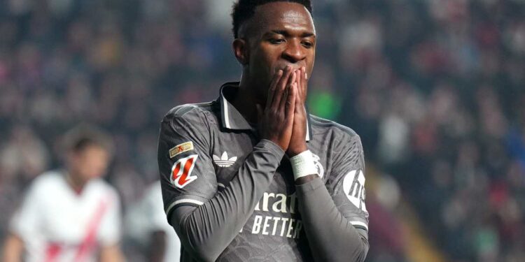 MADRID, SPAIN - DECEMBER 14: Vinicius Junior of Real Madrid reacts to a missed chance during the LaLiga EA Sports match between Rayo Vallecano and Real Madrid at Estadio de Vallecas on December 14, 2024 in Madrid, Spain.  (Photo by Angel Martinez/Getty Images)