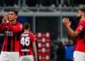 MILAN, ITALY - APRIL 19: Olivier Giroud and Marko Lazetic of AC Milan  cheer the fans afte the Coppa Italia Semi Final 2nd Leg match between FC Internazionale v AC Milan at Giuseppe Meazza Stadium on April 19, 2022 in Milan, Italy. (Photo by Pier Marco Tacca/AC Milan via Getty Images)