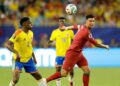 MIAMI GARDENS, FLORIDA - JUNE 27: Cristiano Ronaldo #7 of Portugal is challenged by Jhon Lucumi #3 of Colombia during the FIFA World Cup 2026 Group K match between Colombia and Portugal at Miami Stadium on June 27, 2026 in Miami Gardens, Florida. (Photo by Michael Reaves/Getty Images)