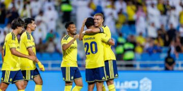 RIYADH DRY PORT, SAUDI ARABIA - AUGUST 21: Cristiano Ronaldo of team Al Nassr FC celebrates scoring their fourth goal during the Saudi Pro League game between Al Riyadh and Al Nassr at Prince Faisal bin Fahd Stadium on August 21, 2026 in Riyadh, Saudi Arabia. (Photo by Abdullah Ahmed/Getty Images)