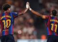 BARCELONA, SPAIN - AUGUST 31: Raphinha of FC Barcelona celebrates with Lamine Yamal of FC Barcelona after scoring the team's first goal during the LaLiga EA Sports 2026/27 match between FC Barcelona and Rayo Vallecano de Madrid at Spotify Camp Nou on August 31, 2026 in Barcelona, Spain. (Photo by Eric Alonso/Getty Images)