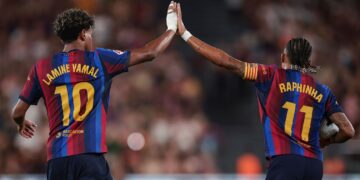 BARCELONA, SPAIN - AUGUST 31: Raphinha of FC Barcelona celebrates with Lamine Yamal of FC Barcelona after scoring the team's first goal during the LaLiga EA Sports 2026/27 match between FC Barcelona and Rayo Vallecano de Madrid at Spotify Camp Nou on August 31, 2026 in Barcelona, Spain. (Photo by Eric Alonso/Getty Images)